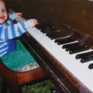 little Drew playing piano